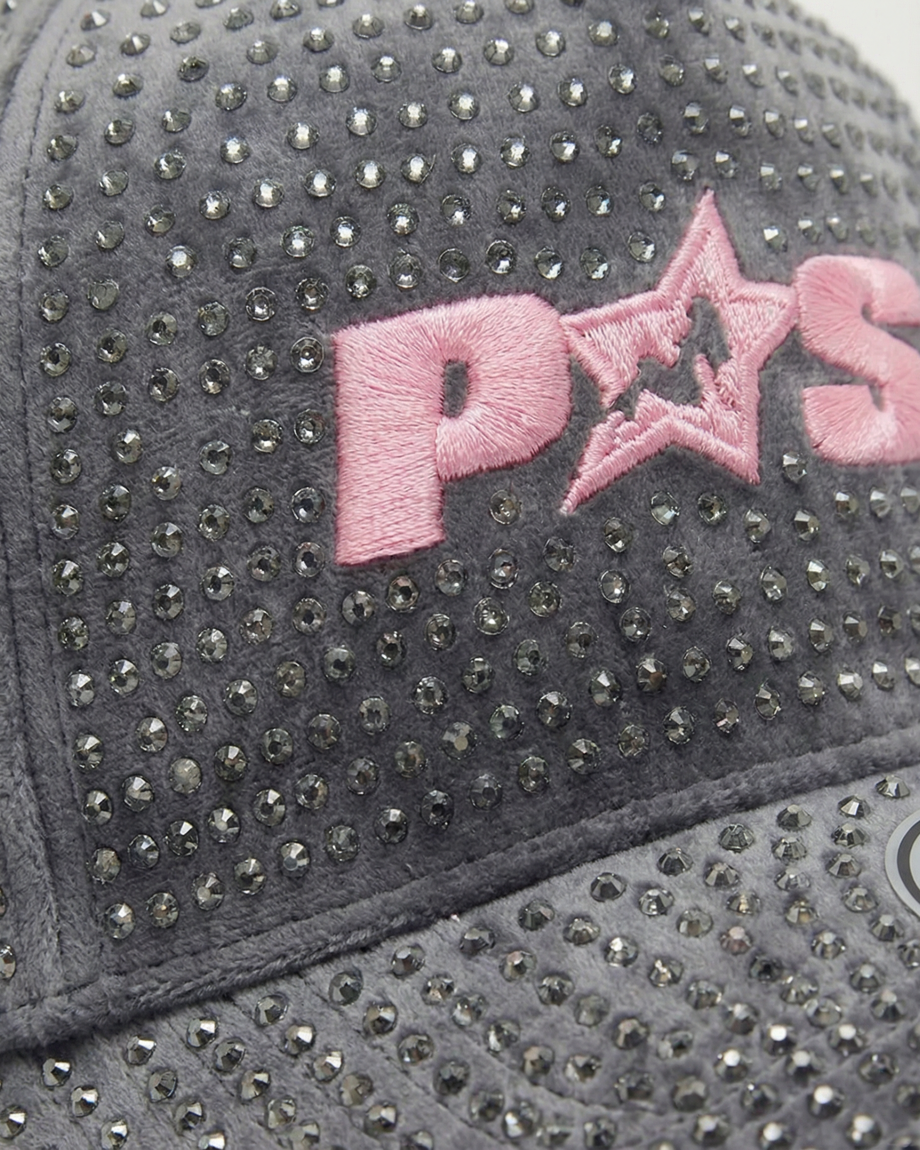 Gray cap with pink logo and rhinestone embellishments